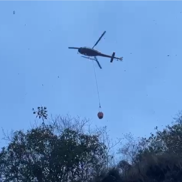 Simrik Air's Helicopter Engaged in Firefighting Operation at Liping Forest, Bhotekoshi